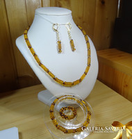 Jewelry set made of Czech glass beads. Necklace, bracelet, earrings and ring. Beautiful honey color.