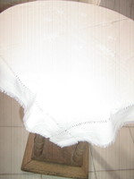 Beautiful white embroidered Kalocsa tablecloth with fringed edges