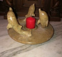 Soapstone (greasestone) dolphins holding candles