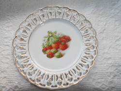 Antique strawberry pattern porcelain plate with an openwork border