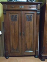 Carved eclectic cabinet