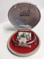 In good condition, marked silver eternal friendship symbolic pendant on a chain, ring, bracelet, earring set