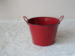 Old red metal flower stand, basket