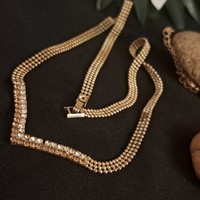 Silver-plated zircon necklaces.