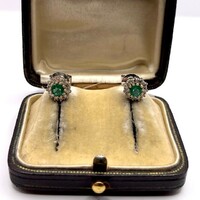 0119. Stud earrings with diamonds and emeralds