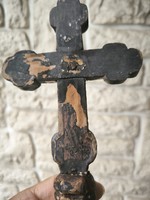 Antique wooden crucifix in hand, durable, 1800s. Procession with candles.