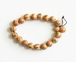 Bracelet made of ceramic/porcelain beads with a lotus pattern and Chinese frills