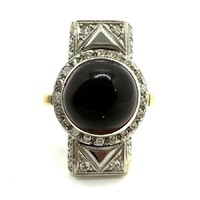 Art deco ring on cabochon with onyx and diamonds