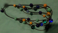 50 Cm, cheerful necklace made of glass and ceramic beads.