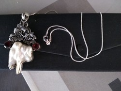 Natural biwa pearl in 925 marked socket, silver chain with garnet stones