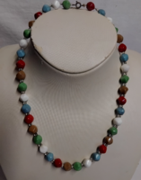 Old retro necklace made of beautiful colored porcelain beads