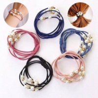 Hair elastic with white pearl decoration 13