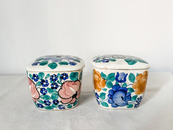 A pair of faience porcelain spice holders