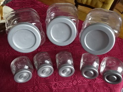 Kitchen glass storage, three large and five small. He has!