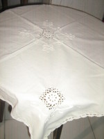 Beautiful hand-crocheted raw white tablecloth with inset and sewn edges