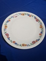 Colorful plain porcelain plate with flowers