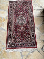 Old Iranian? A hand-knotted carpet or even a wall protector ideal as a wall protector