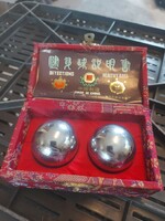 Chikung balls, in good condition, with box