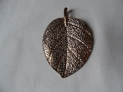 Gold colored leaf pendant