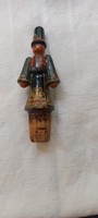 Wood-carved folk costume cork stopper