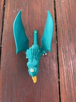 Dinoszaurusz játékfigura. Új! Unokám gyűjtötte. Mérete: 12 cm magas x10 cm széles. Sötétzöld színű.
