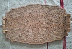 Hand-carved tray with folk motifs