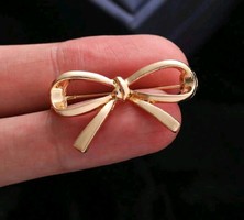 Aranyozott masnis bross