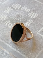 Ónixköves 14 K női gyűrű.