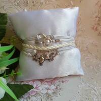 ÚJ, fehér műbőr karkötő fém díszekkel - galamb, LOVE, szív