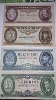 Négy bankjegyből álló forint sor.