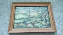 Signed watercolor in a frame behind double glass
