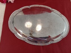 Silver-colored, large aluminum serving tray
