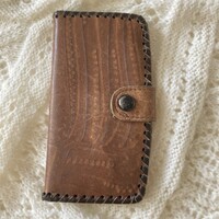Leather wallet with embossed print