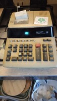 SHARP retro electric tape calculator.