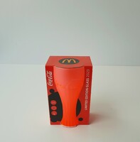 Narancssárga színű Coca-Cola pohár
