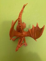 Sárkány,dinoszaurusz,új állapotban az unokám gyűjteményéből.15 cm hosszú.