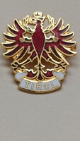 Tirol zománcozott jelvény