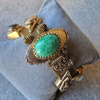 1940s, American gold-tone multiple rhinestones of various shapes and colors bracelet