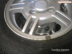 SUZUKIRA SZÉP GUMIS ALU FELNIK 4DB GARÁZSBÓL LEÁRAZVA CONTINENTÁL RADIÁL GUMIKKAL155 / 70 / R 13:75T