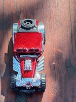 Hot Wheels versenyautó. Nagyon szép teljesen  új állapotban. 6,5 cm Bordó színű.