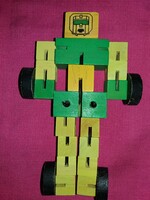 Érdekes fából készült TRANSFORMERS figura rengeteg variációs lehetőség, szép állapot a képek szerint