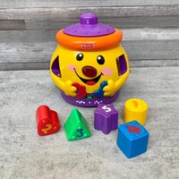 Fisher-Price formabedobó csupor angol-magyar