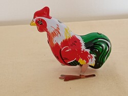 Felhúzós fém ugráló kakas játék 3-4 éves gyerekjáték mechanikus