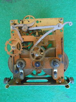 Rugós falióra szerkezet