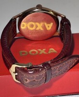 Gyűjteményből hibátlan Arany 14 K Doxa, gyári doboz, Hírsh szíj pontos 36 mm k.n. netto 8.5 gr arany