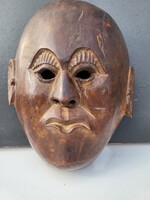 Hand carved tropical hardwood mask. A symbol of masculinity and mystery