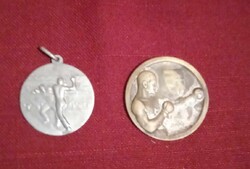 2 Silver medals highlighting Wrestling in the 30s and 40s
