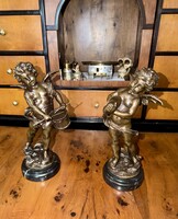 Zenélő bronz putto pár