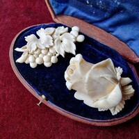 Two antique carved brooches