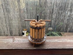 Retro mockup of a grape press.